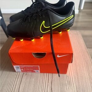Nike Kids Black Soccer Cleats with Neon Yellow Swoosh